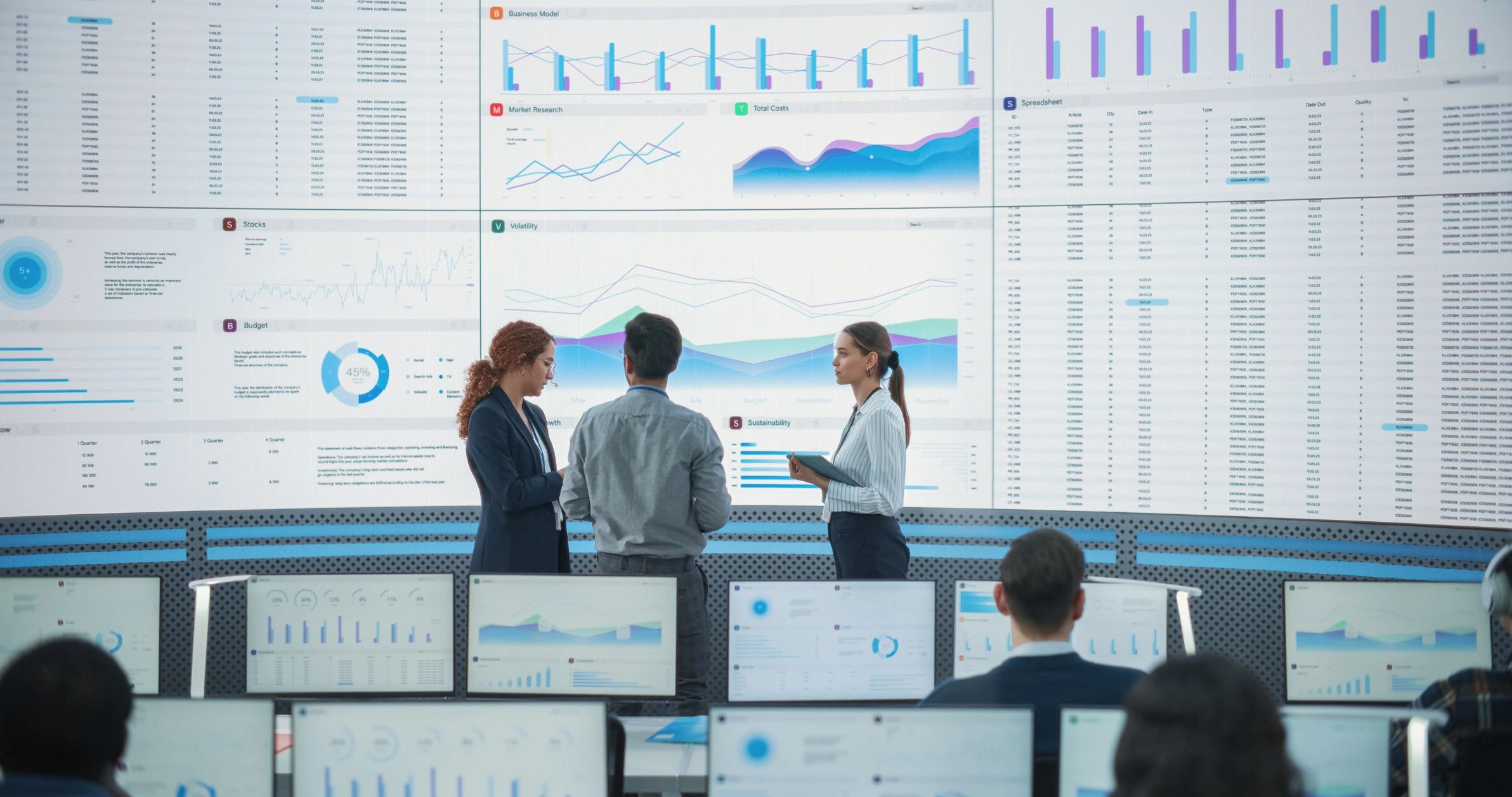 Cybersecurity team monitoring network activity in a modern operations center